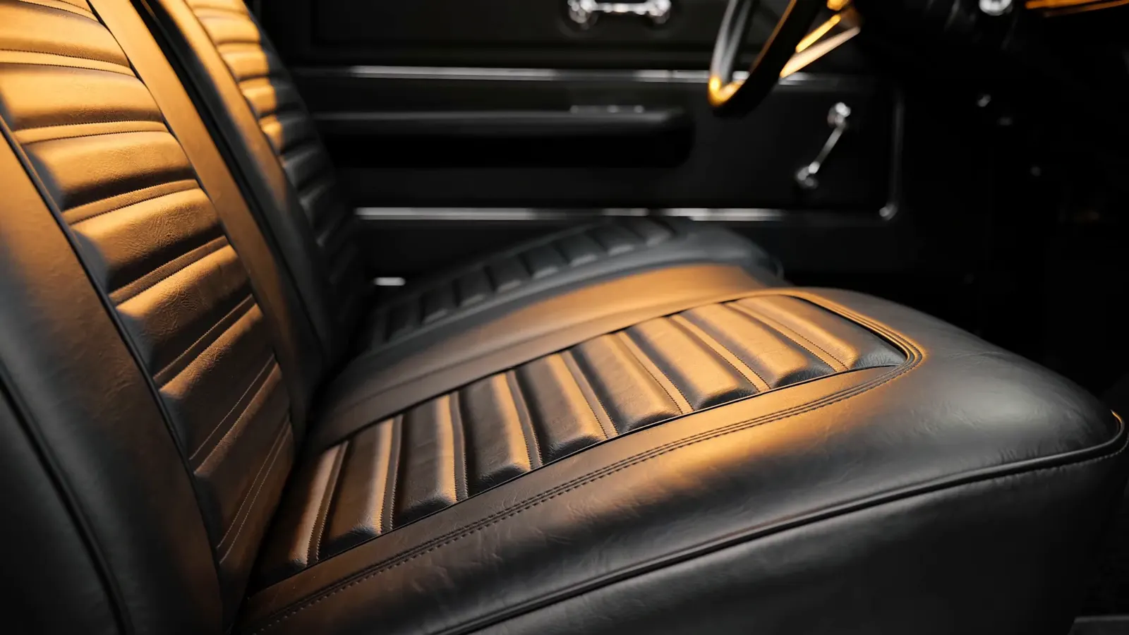 Illustrative classic car view: leather & carpet